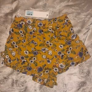 LF yellow floral print shorts with lace up sides